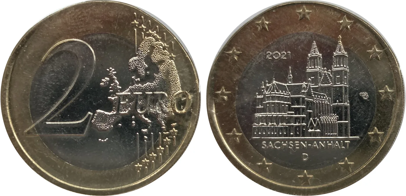Zum Vergrößern klicken Deutschland 2 Euro 2021 „Sachsen-Anhalt“, geprägt auf einer 1-Euro-Ronde. Das Stück wiegt nur 7,50 g und fällt sofort durch die vertauschten Farben von Ring und Pille auf.