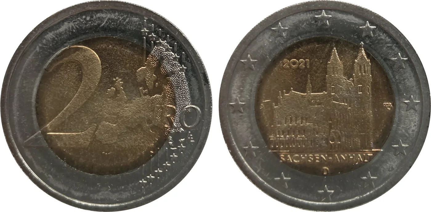 Zum Vergrößern klicken Deutschland 2 Euro 2021 „Sachsen-Anhalt“ A, geprägt mit einer unbekannten Fremdronde als Pille. Aufgrund der abweichenden Materialhärte ist das Münzbild im Zentrum nur schwach ausgeprägt.